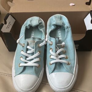 Converse Low Top Slip-On Sneakers in Light Aqua and White